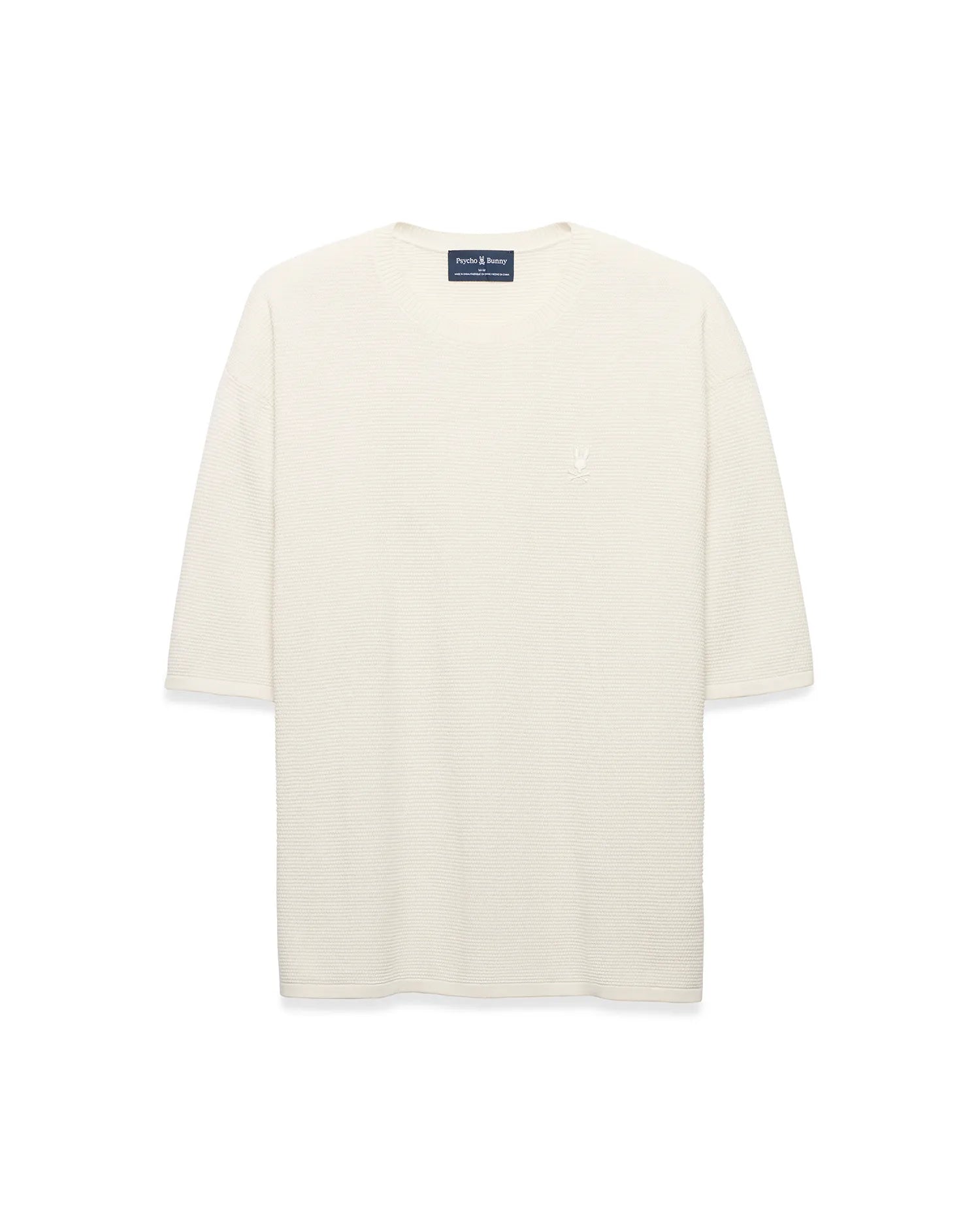 Mens Makai Textured Knit T-Shirt in cream, featuring a relaxed fit, subtle horizontal textured knit, and a small tonal embroidered Psycho Bunny skull logo on the left chest.