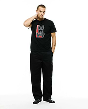 Men's Lowell Graphic Tee, a black classic-fit jersey t-shirt featuring a large chest print of the iconic Psycho Bunny skull and crossbones logo in white with a red rectangular background and vertical Psycho Bunny text. (5)