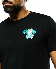 Black classic fit jersey Mens Miami Back Graphic Tee featuring a small embroidered Psycho Bunny skull logo in white, teal, and orange, accented by teal palm trees on the left chest. (2)