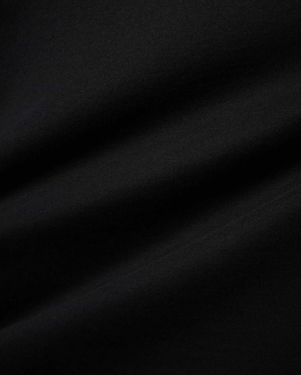 Premium black jersey Mens Miami Back Graphic Tee, showcasing a soft, smooth texture with subtle drapes, offering a refined streetwear aesthetic for versatile styling. (6)