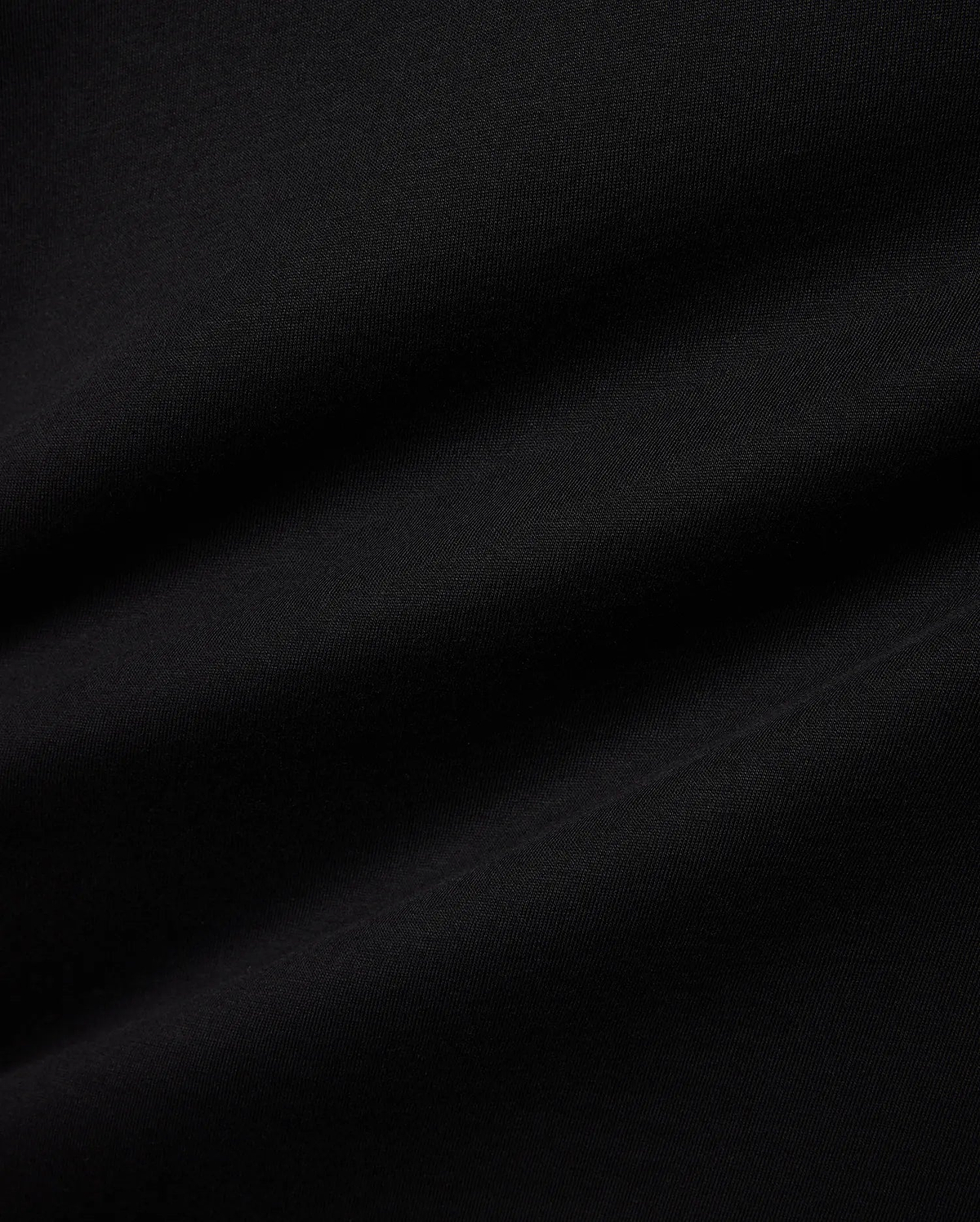 Premium black jersey Mens Miami Back Graphic Tee, showcasing a soft, smooth texture with subtle drapes, offering a refined streetwear aesthetic for versatile styling. (6)