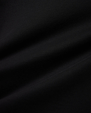 Premium black jersey Mens Miami Back Graphic Tee, showcasing a soft, smooth texture with subtle drapes, offering a refined streetwear aesthetic for versatile styling. (6)
