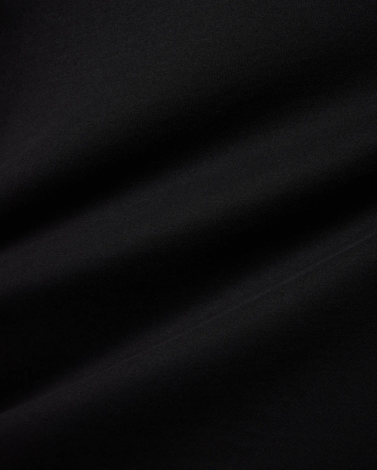 Premium black jersey Mens Miami Back Graphic Tee, showcasing a soft, smooth texture with subtle drapes, offering a refined streetwear aesthetic for versatile styling. (6)