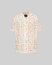Mens Atlas Tencel Shirt, a relaxed fit short-sleeve shirt in off-white Tencel, featuring an all-over pastel grid pattern with subtle repeated Psycho Bunny skull logos and a camp collar.