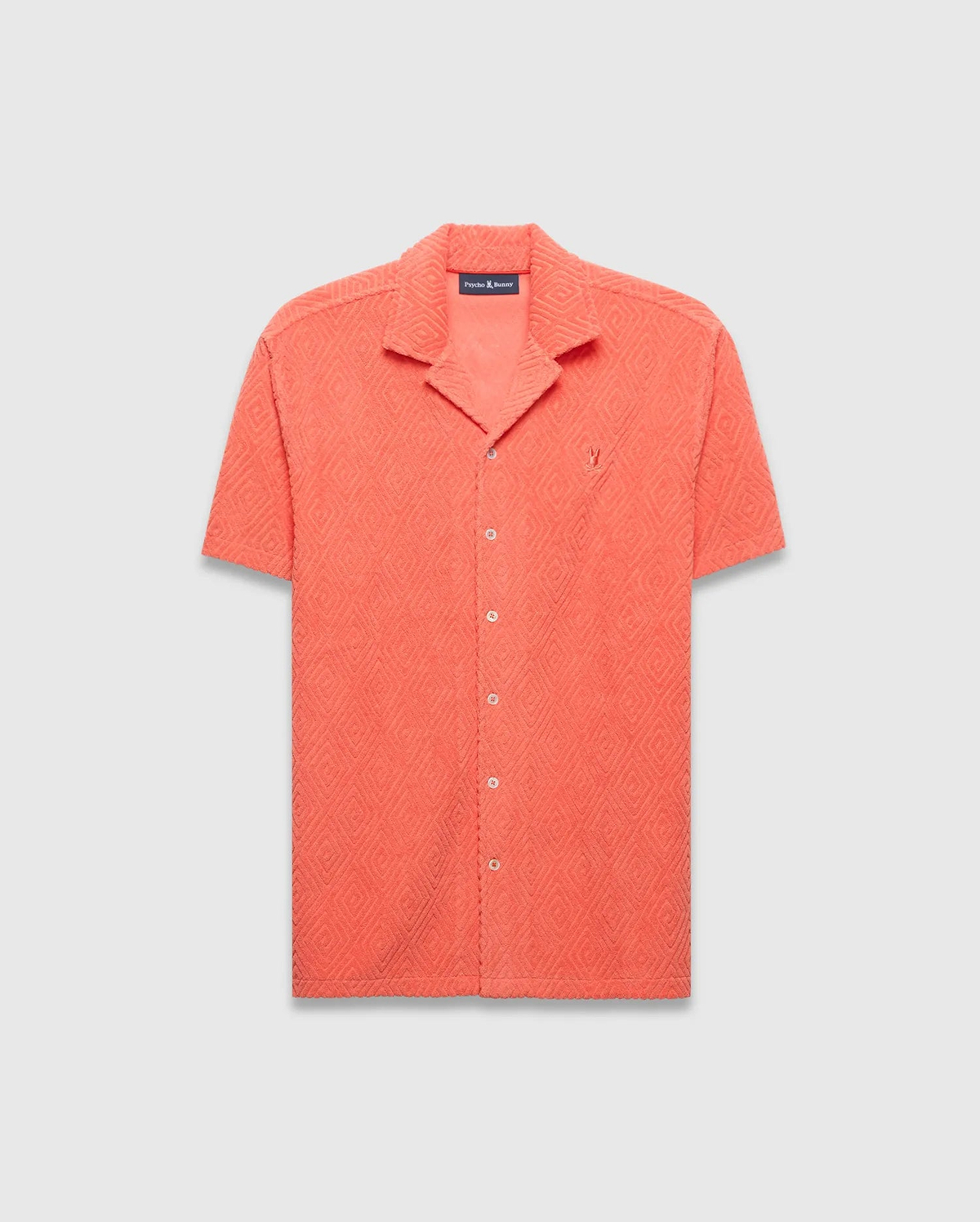 Mens Tristan Shirt, coral relaxed fit short-sleeve camp collar shirt with textured diamond jacquard pattern and small embroidered Psycho Bunny skull logo on left chest. (5)