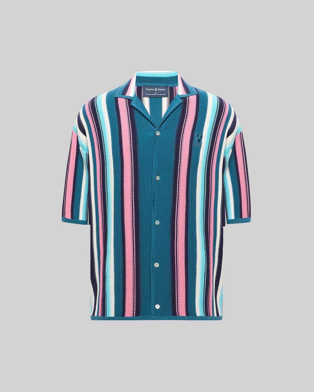 Mens Cliff Shirt, a relaxed fit knitted short-sleeve button-up with vibrant teal, pink, light blue, white, navy vertical stripes, and an embroidered Psycho Bunny skull logo on the left chest. (4)
