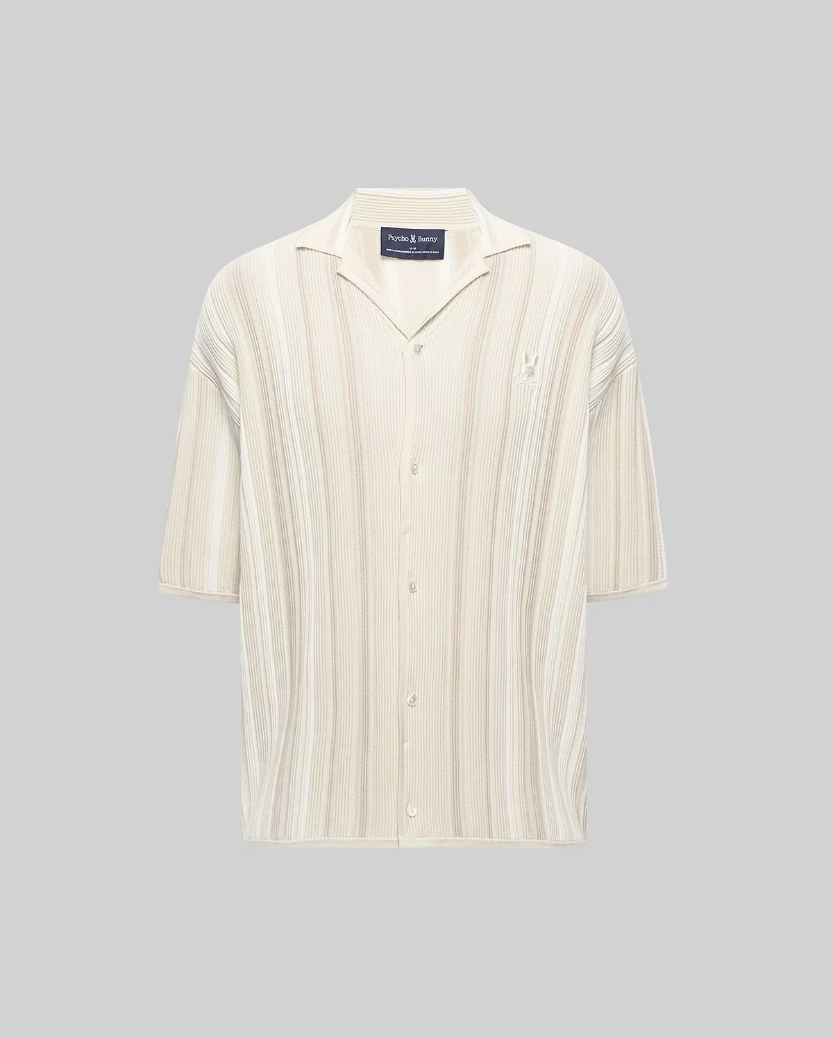 Mens Cliff Shirt, a relaxed fit cream and beige striped ribbed knit button-up with a camp collar, short sleeves, and a small embroidered Psycho Bunny skull logo on the left chest.