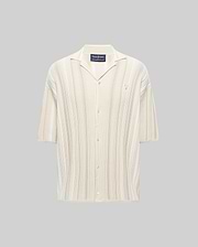 Mens Cliff Shirt, a relaxed fit cream and beige striped ribbed knit button-up with a camp collar, short sleeves, and a small embroidered Psycho Bunny skull logo on the left chest.