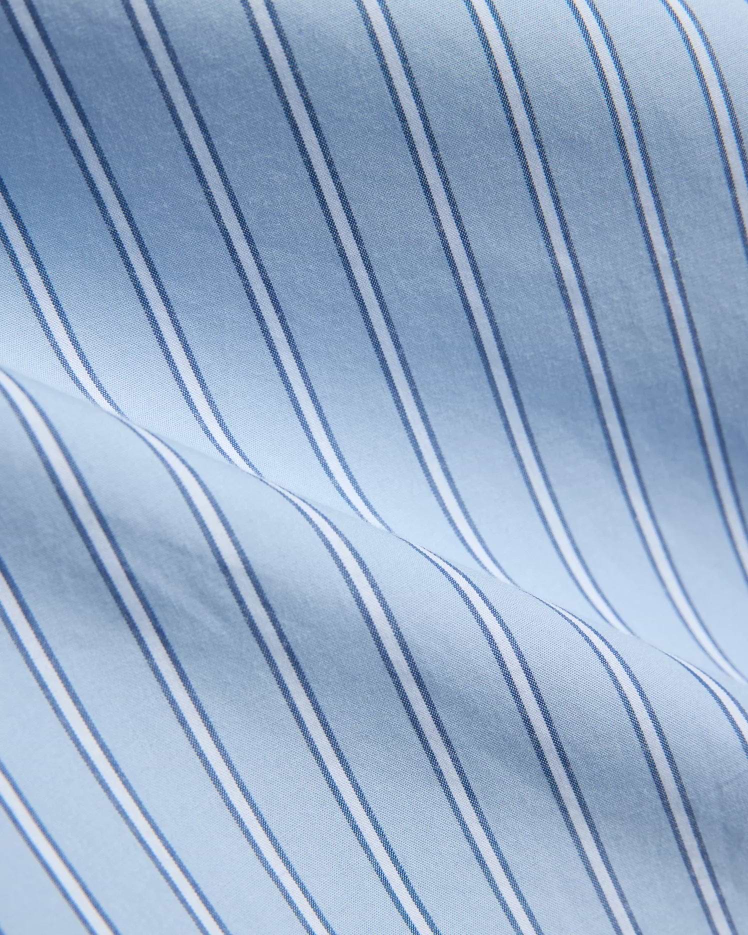 Mens Duncan Stripe Shirt, a premium light blue fine woven fabric shirt, featuring crisp white vertical stripes bordered by thin navy blue pinstripes, creating a sophisticated, bold pattern. (7)