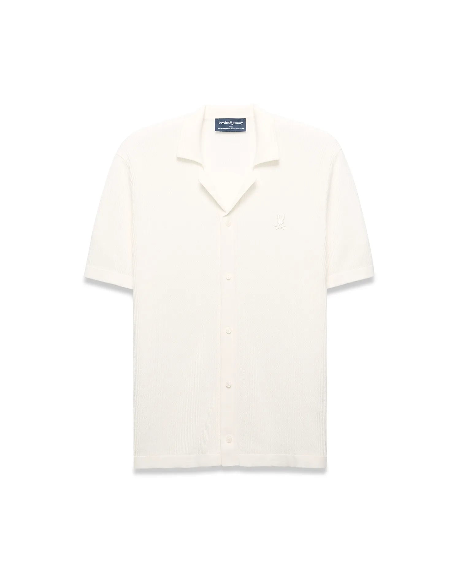 Mens Yann Knit Shirt, cream ribbed knit, short-sleeve, full button-front, camp collar, with a small embroidered Psycho Bunny skull logo on the left chest, classic fit.
