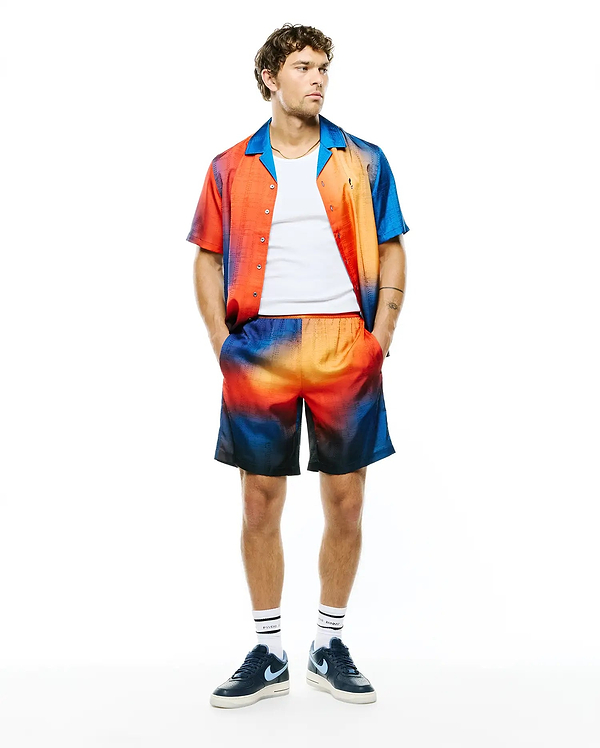 Mens Zander Jacquard Shirt and matching shorts, featuring a vibrant blue to orange gradient ombre print, subtle jacquard texture, and relaxed fit.