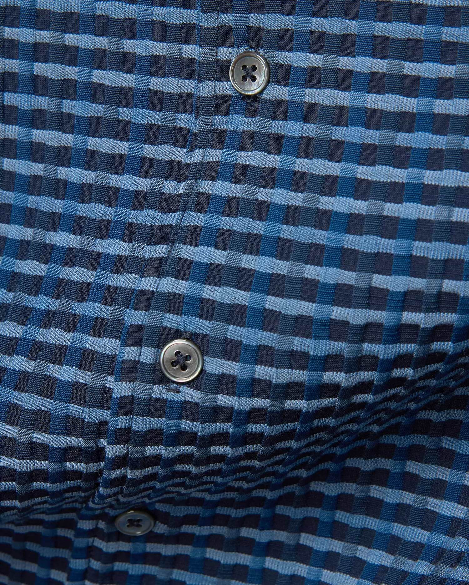 MENS Erik Raised Check Shirt, a premium blue and navy textured woven shirt featuring a distinctive raised check pattern with subtle puckering and dark grey buttons.