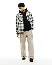 Mens Kessler Relaxed Plaid Overshirt in cream, black, and grey, featuring a soft, brushed texture, button-front, and two chest flap pockets, layered over a black hoodie.