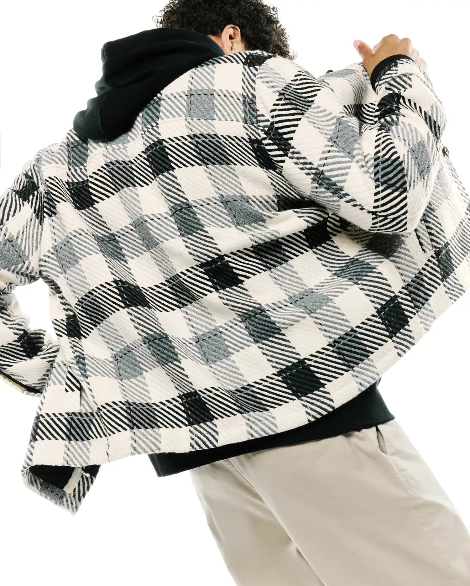 Mens Kessler Relaxed Plaid Overshirt in cream, black, and grey, showcasing a prominent textured, ribbed plaid pattern with a relaxed fit, layered over a black hoodie.