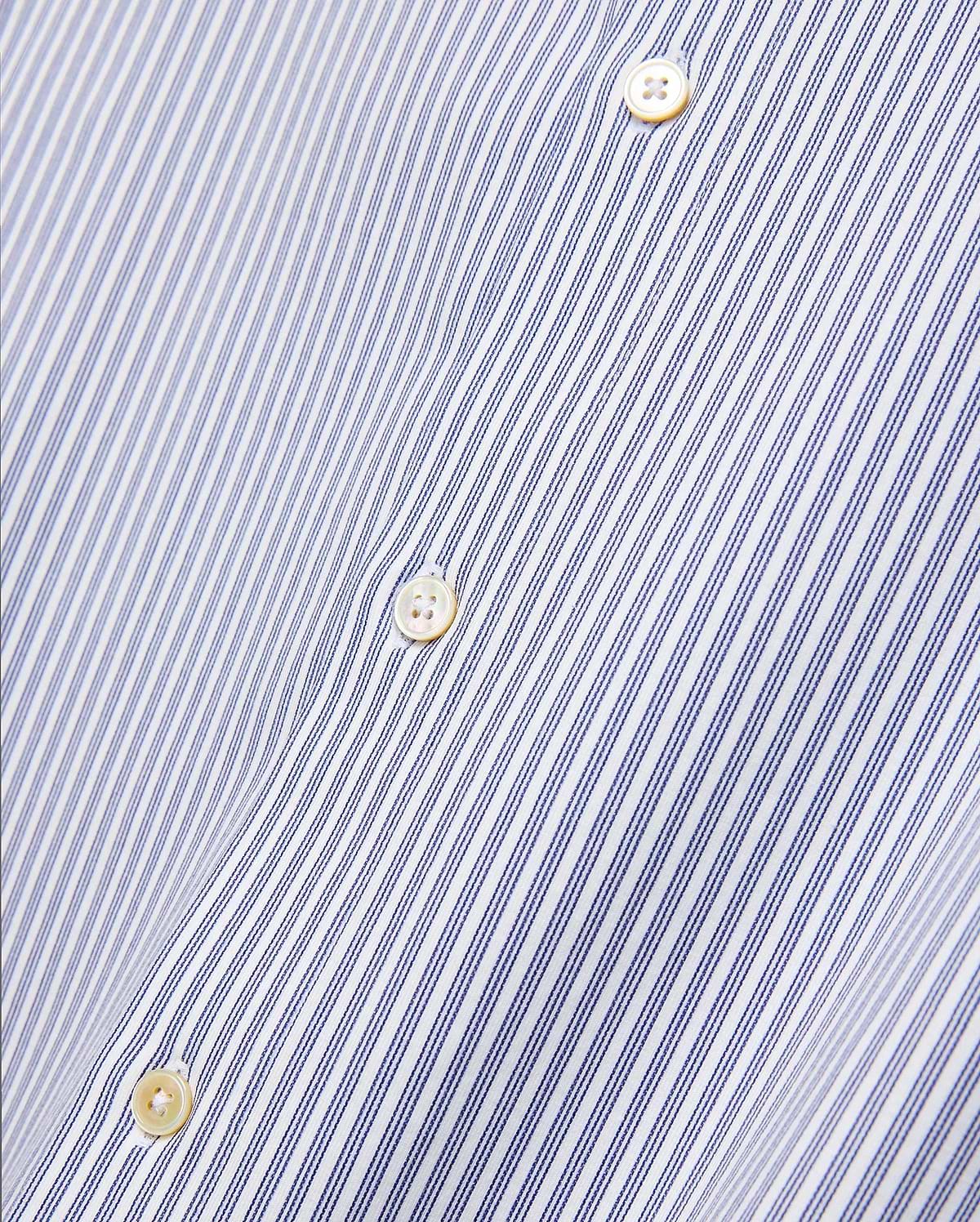 Mens Jim Stripe Jersey Knit L/s Shirt, a premium white long-sleeve shirt featuring fine blue vertical pinstripes and lustrous mother-of-pearl buttons, reflecting refined streetwear aesthetics. (6)