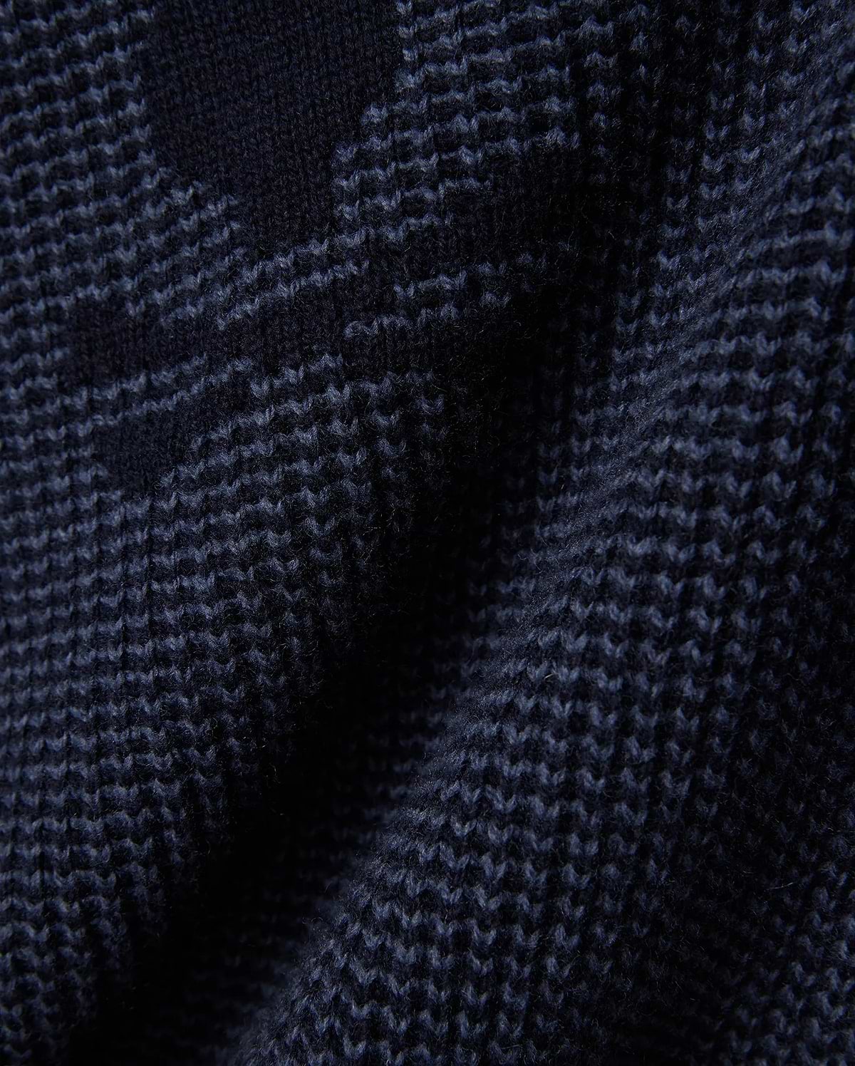 Mens Atkinson Cardigan, a dark navy blue chunky knit cardigan featuring a subtle, textured geometric pattern in lighter blue, crafted from a soft, premium knit fabric.