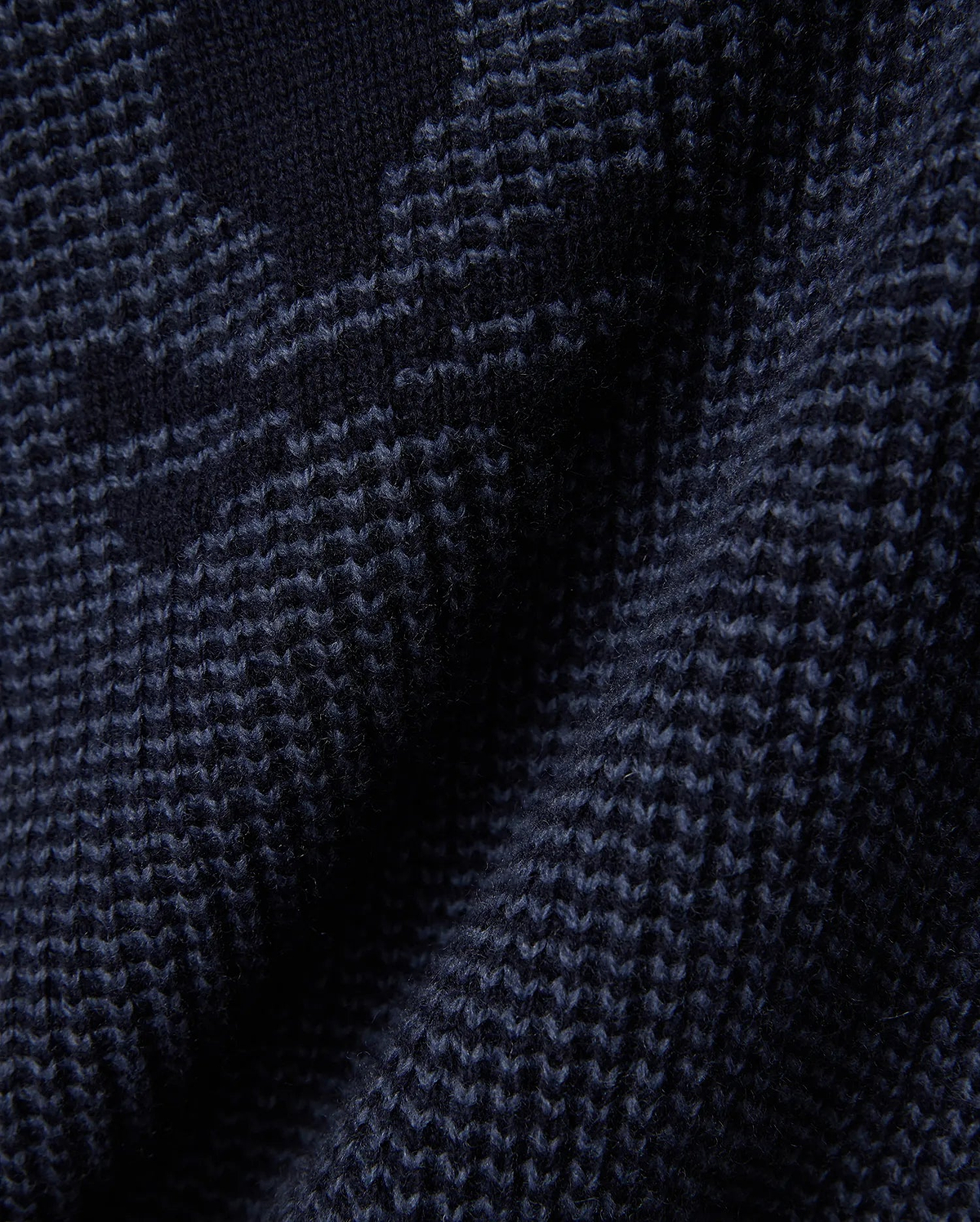Mens Atkinson Cardigan, a dark navy blue chunky knit cardigan featuring a subtle, textured geometric pattern in lighter blue, crafted from a soft, premium knit fabric.