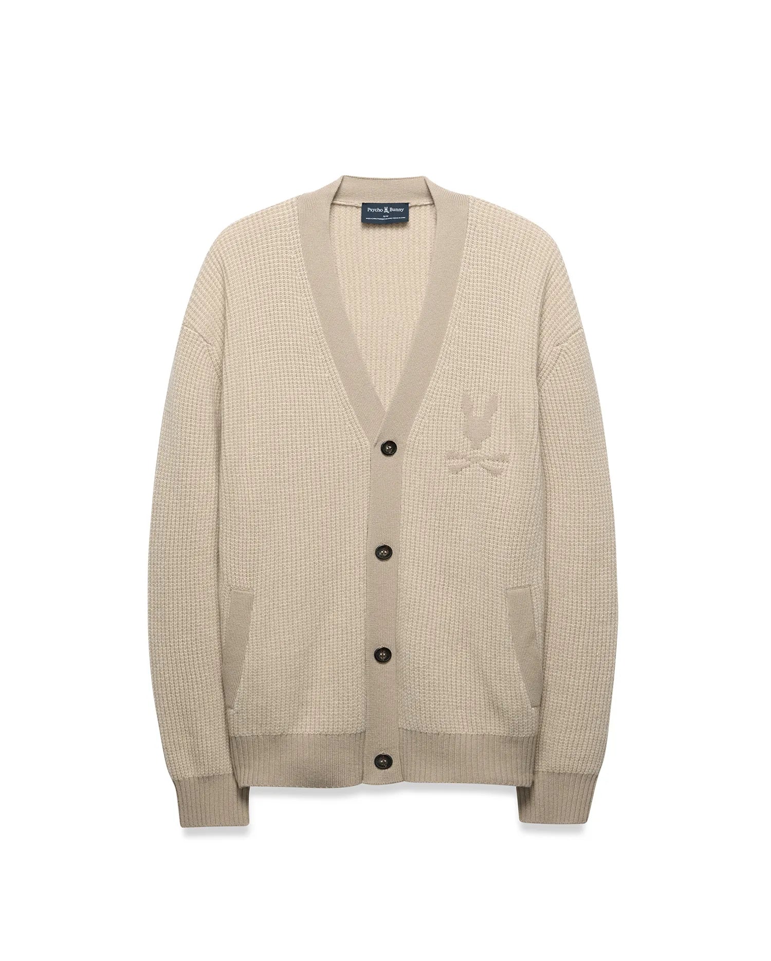 Mens Atkinson Cardigan in beige waffle knit, relaxed fit, with V-neck, dark buttons, front patch pockets, and a tone-on-tone embroidered Psycho Bunny skull logo on the left chest.
