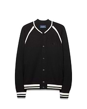 Mens Rafferty Cardigan: Black knit varsity cardigan with white stripe accents on ribbed collar, raglan sleeves, cuffs, and hem, featuring snap buttons and a small embroidered Psycho Bunny skull logo on the left chest.