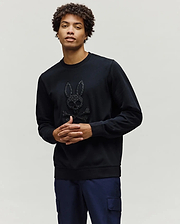 Black Mens Gabin Textured Crew sweatshirt, a classic fit crafted from textured black fabric, featuring a large, raised Psycho Bunny skull and crossbones logo on the chest.
