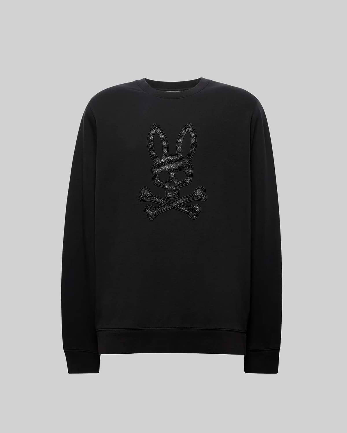 Black Mens Gabin Textured Crew sweatshirt in a soft jersey knit, classic fit, featuring a large, textured black Psycho Bunny skull and crossbones logo embroidered on the chest.