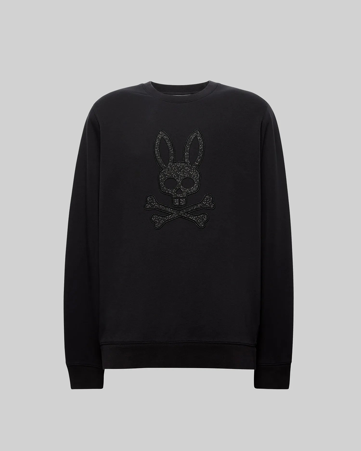 Black Mens Gabin Textured Crew sweatshirt in a soft jersey knit, classic fit, featuring a large, textured black Psycho Bunny skull and crossbones logo embroidered on the chest.