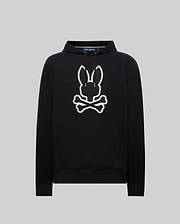 Black Mens Gage Patch Hoodie, relaxed fit, soft cotton blend. Large white embroidered Psycho Bunny skull and crossbones patch with zig-zag stitching on the center chest, plus a front kangaroo pocket.