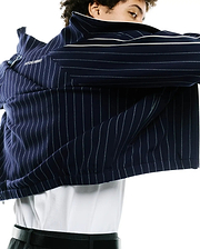 Mens Harland Double Weave Chalk Stripe Track Jacket, a premium navy streetwear piece with crisp white pinstripes, bold white sleeve and collar stripes, and the iconic Psycho Bunny text branding on the upper back. (3)