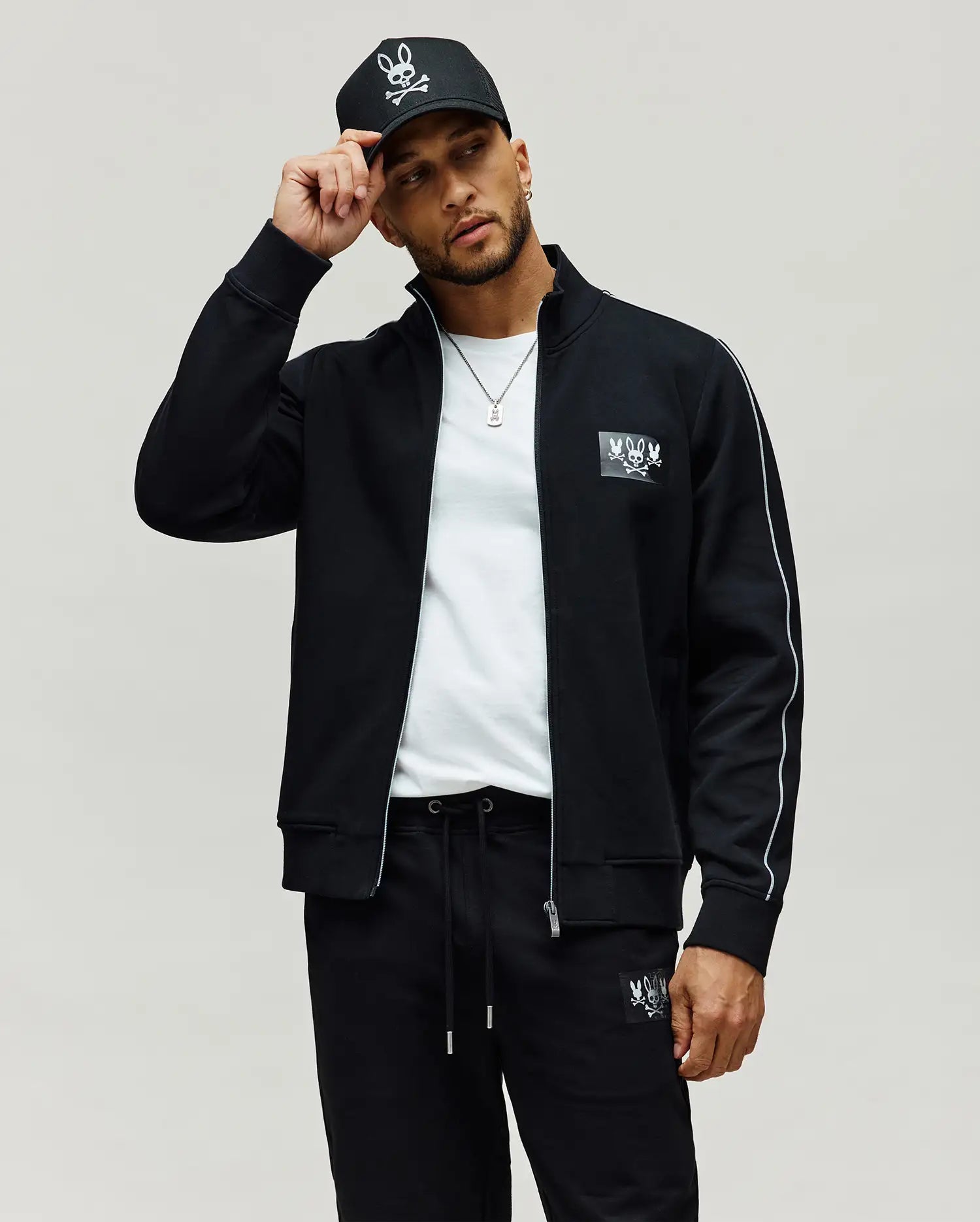 Men's Jarvis Hologram Track Bomber in Black | Psycho Bunny