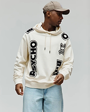 Cream Mens Toby Oversized Hoodie with bold, scattered black Psycho Bunny text and iconic bunny skull graphics on a soft, relaxed fit French terry fabric.
