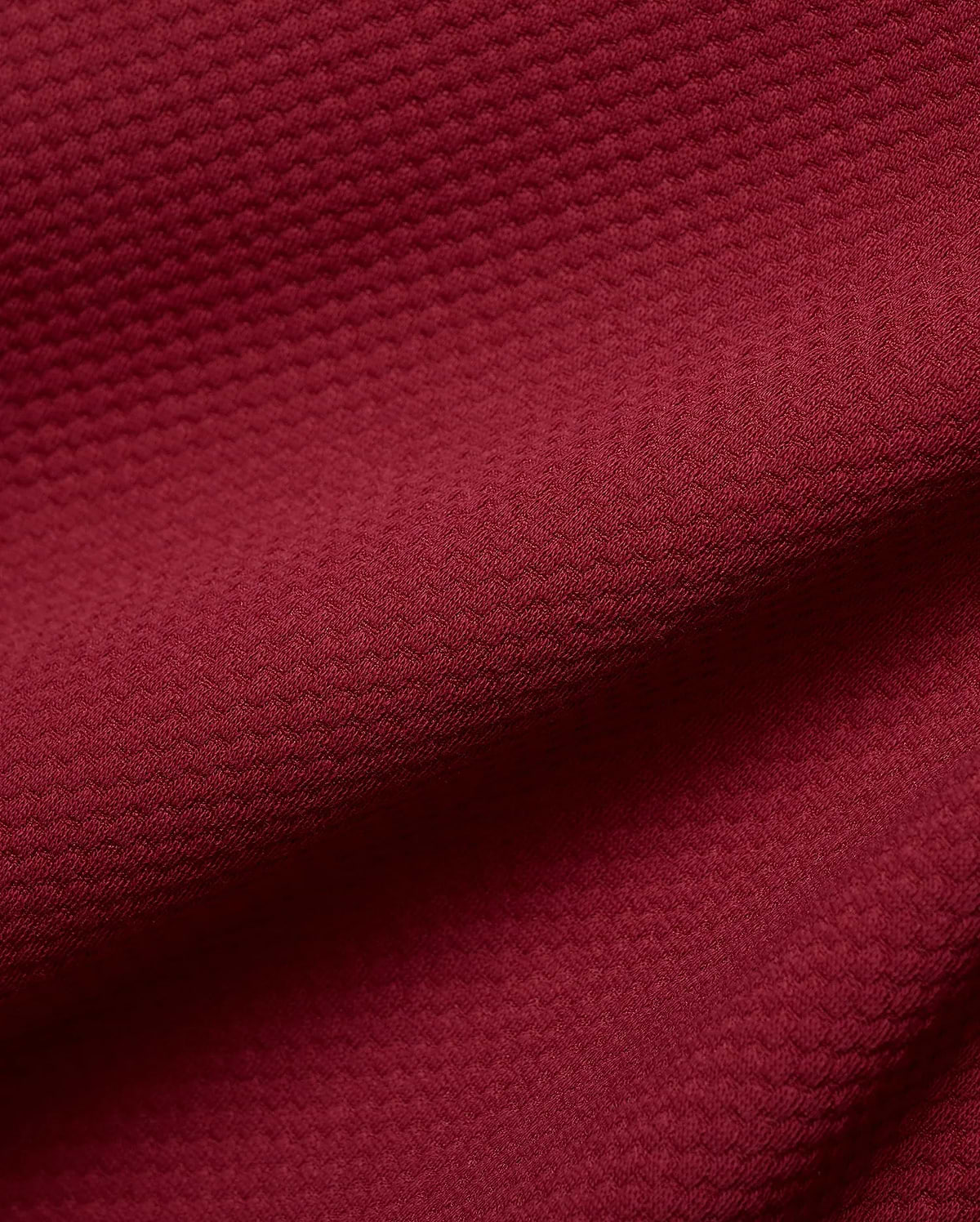 Mens Marc Textured Full Zip Hoodie in a deep, luxurious burgundy, showcasing its refined, small-scale geometric waffle knit fabric, perfect for premium streetwear.