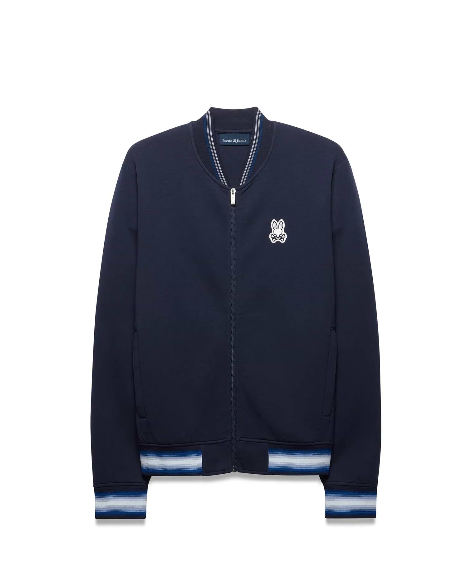 Mens Jaydon Track Jacket in navy, featuring a classic fit, smooth jersey fabric, embroidered white Psycho Bunny skull logo on the left chest, and striped ribbed collar, cuffs, and hem in white and blue. (5)
