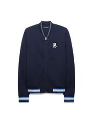 Mens Jaydon Track Jacket in navy, featuring a classic fit, smooth jersey fabric, embroidered white Psycho Bunny skull logo on the left chest, and striped ribbed collar, cuffs, and hem in white and blue. (5)