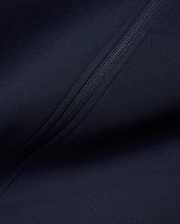 Mens Jaydon Track Jacket in deep navy, crafted from a smooth, performance-ready knit fabric, featuring a sleek, tonal full-zip closure for a refined streetwear look. (6)