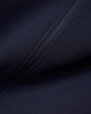 Mens Jaydon Track Jacket in deep navy, crafted from a smooth, performance-ready knit fabric, featuring a sleek, tonal full-zip closure for a refined streetwear look. (6)