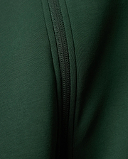 Mens Jaydon Track Jacket in a rich, deep forest green, featuring a prominent tonal zipper closure and a finely textured ribbed knit fabric.