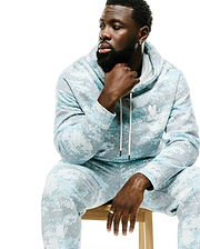 Men's Alfie All-Over Print Hoodie in light blue, white, and grey pixelated digital camo pattern, featuring a drawstring hood, relaxed fit, and small embroidered white Psycho Bunny skull logo on the left chest. (4)