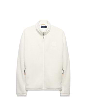 Men's Rowley Sherpa Zip Jacket, a cream-colored full-zip jacket with a soft sherpa texture, features a large embroidered Psycho Bunny skull logo on the left chest and orange/navy accent zipper pulls. (5)