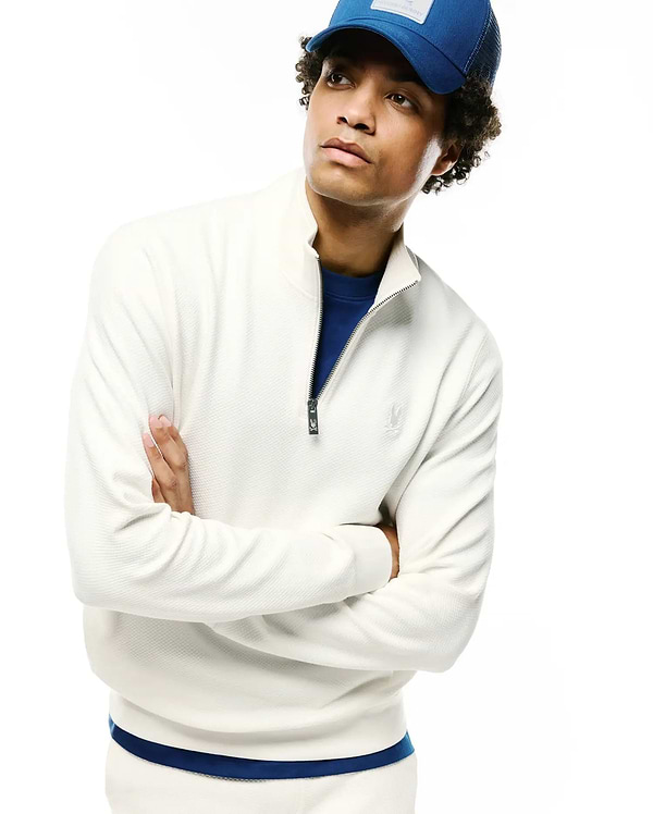 Mens Marc Textured 1/4 Zip in cream, featuring a classic fit, textured waffle knit fabric, a silver 1/4 zip closure with a dark Psycho Bunny logo pull, and a tonal embroidered left chest logo.