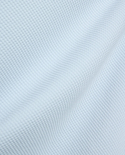 Mens Marc Textured 1/4 Zip in a soft light blue, crafted from a premium, refined pique-textured fabric with subtle folds, reflecting Psycho Bunny's elevated streetwear aesthetic.
