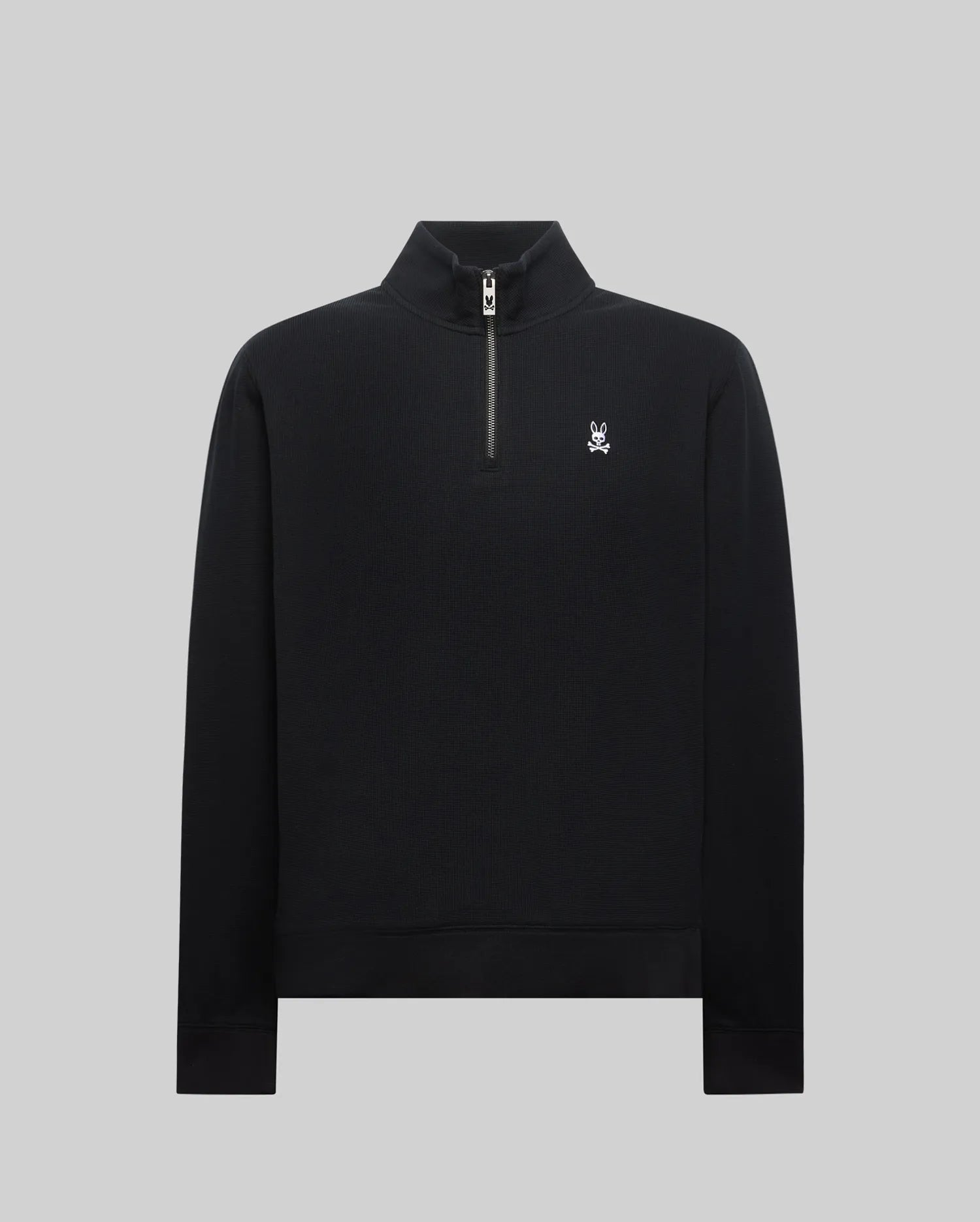MENS MAXTON WAFFLE 1/4 ZIP in black, featuring a classic fit, textured waffle knit fabric, a silver 1/4 zip with a custom pull, and a small embroidered white Psycho Bunny skull logo on the left chest. (5)