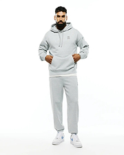 Mens Terrence Fleece Hoodie in light grey, featuring a relaxed fit, soft French terry fabric, drawstring hood, kangaroo pocket, and a small embroidered Psycho Bunny skull logo on the left chest.