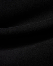 Men's Samson Quarter-Zip Sweater in classic black, crafted from a soft, smooth jersey knit fabric, showcasing its premium texture with subtle folds. (6)