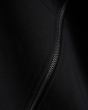Black Mens Jonathan Zip Hoodie, a premium streetwear piece crafted with a sleek black zipper and a fine, subtle diagonal ribbed knit texture. (6)