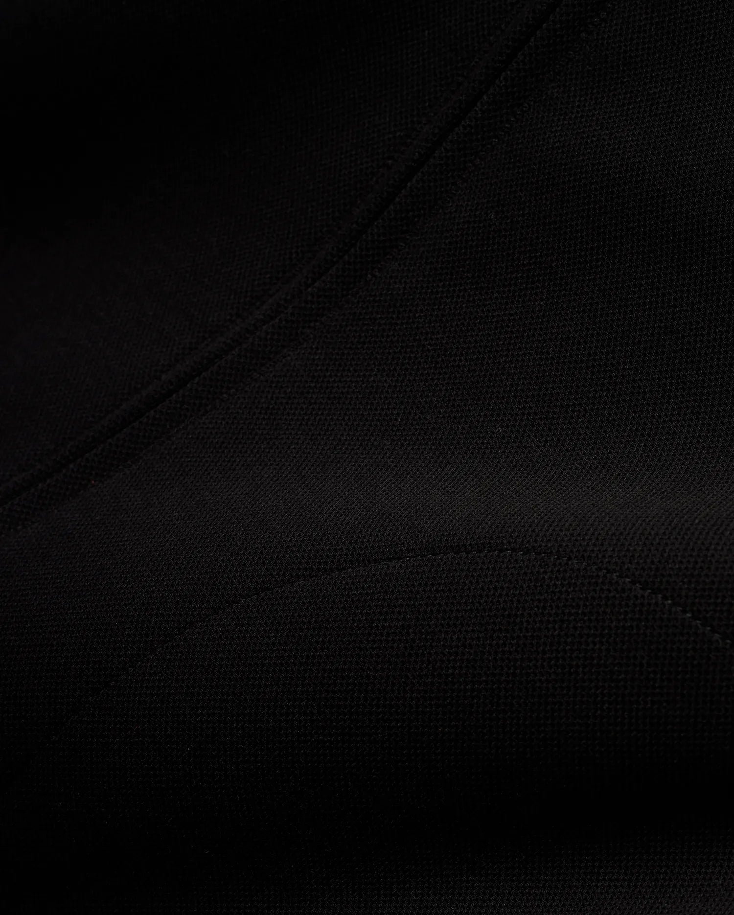 Men's Jacques Pique Track Jacket, a premium black garment crafted from a distinctive pique knit fabric, showcasing its refined texture and precise stitching for a sophisticated streetwear aesthetic. (6)