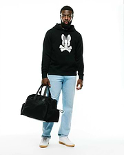 Men's Samson Cotton Hoodie, a black relaxed fit french terry hoodie featuring a prominent white and grey textured Psycho Bunny skull and crossbones logo on the chest. (4)