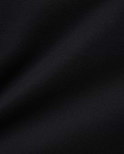 Women's Clara Pique Dress in rich, solid black, highlighting the premium, breathable pique knit fabric with its subtle, textured weave, reflecting Psycho Bunny's refined streetwear aesthetic.