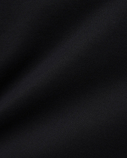 Women's Clara Pique Dress in rich, solid black, highlighting the premium, breathable pique knit fabric with its subtle, textured weave, reflecting Psycho Bunny's refined streetwear aesthetic.