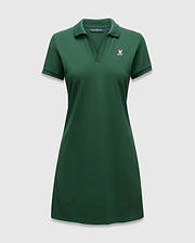 Women's Clara Pique Dress in dark green, featuring a classic fit, pique knit fabric, polo collar, V-neck, and a small embroidered pink Psycho Bunny skull logo on the left chest. (5)