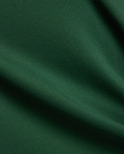 Women's Clara Pique Dress, a premium streetwear piece in rich deep forest green, featuring a classic, breathable pique knit texture with subtle fabric folds. (6)